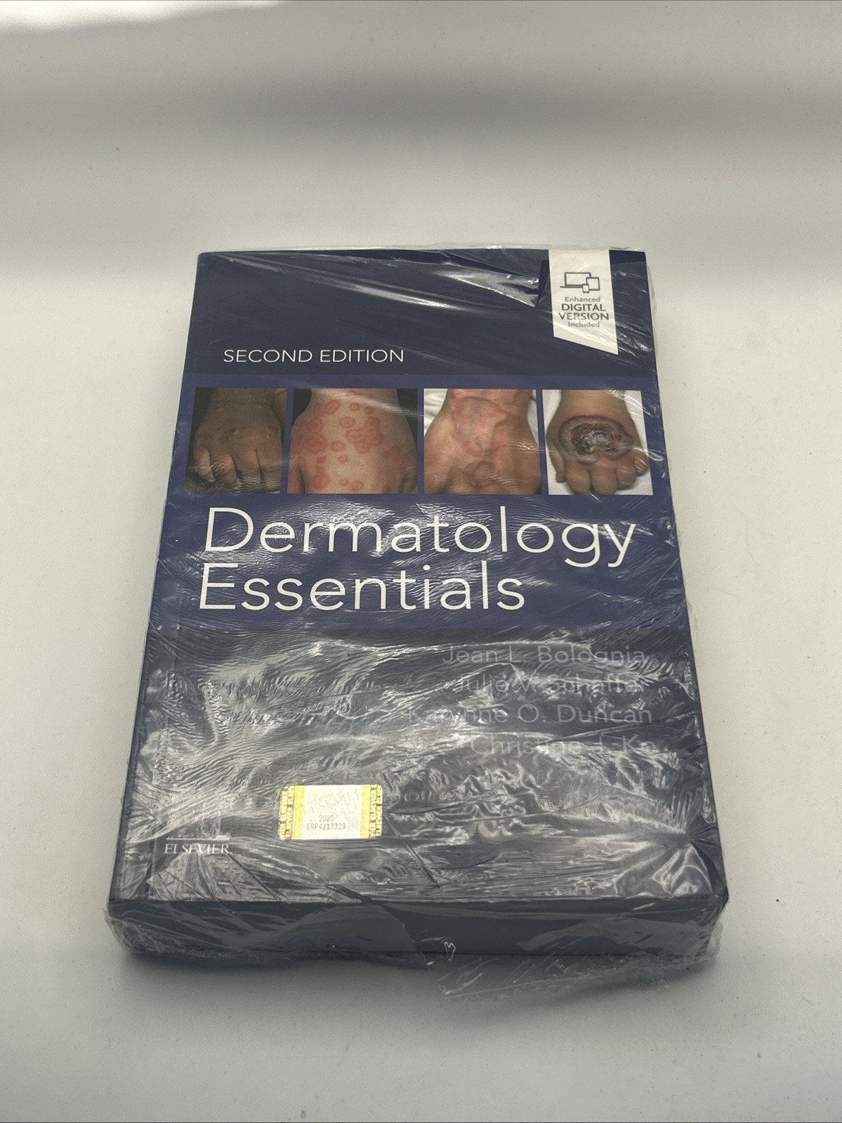 NEW Dermatology Essentials – Paperback, by Bolognia MD Jean L.; Schaffer MD