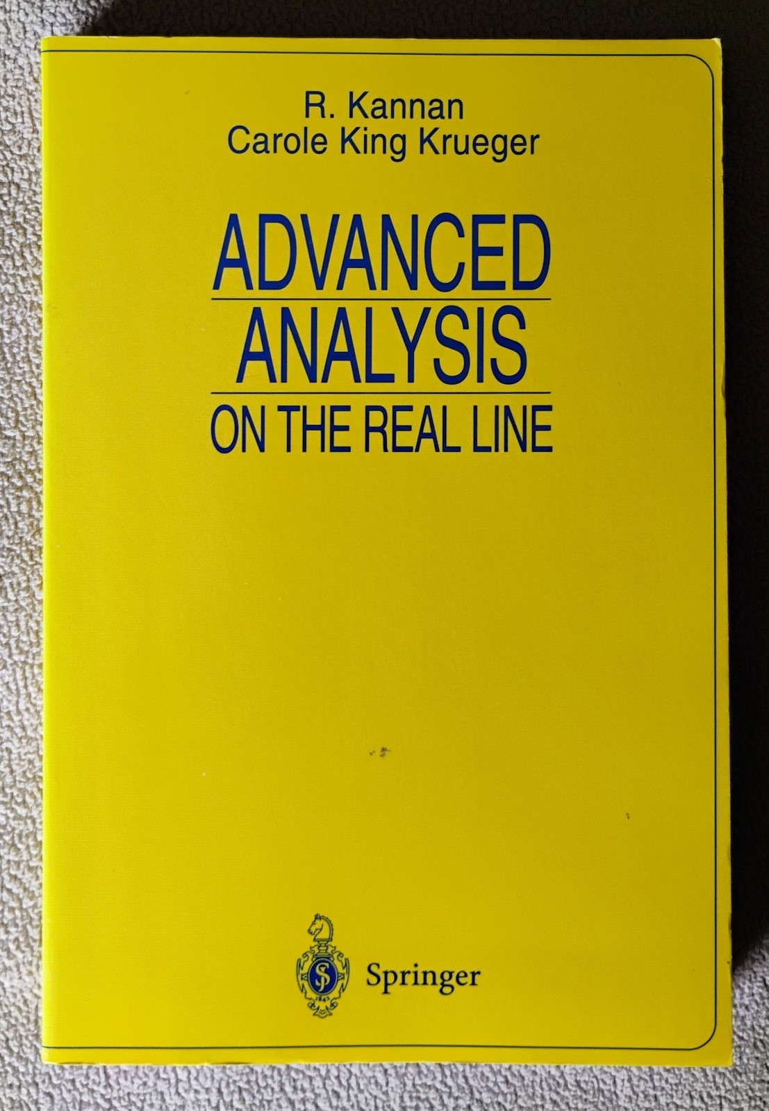 Advanced Analysis on the Real Line by Carole K. Krueger and 1 more.